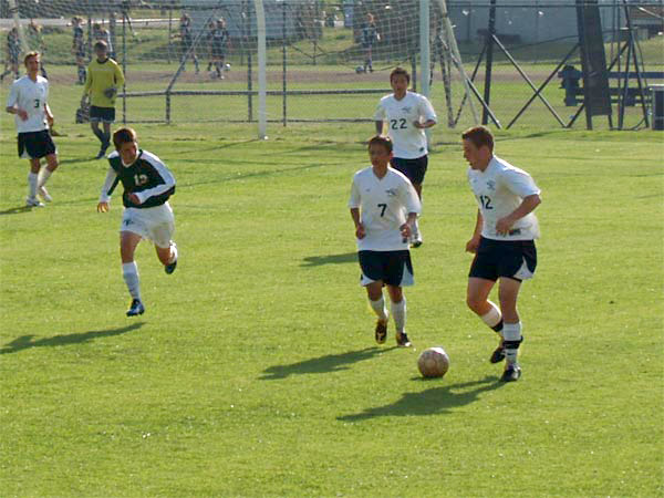 same soccer photo, lightened and haze removed